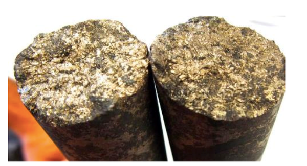 Drill core from Mammoth showing Semi massive & veined mixed sulphides in sheared mafic host